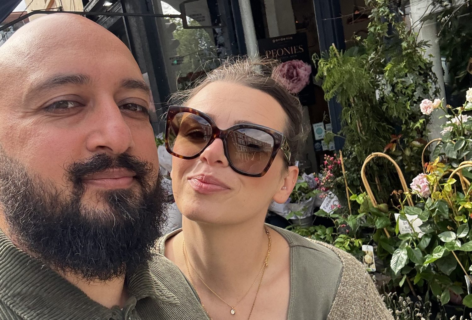 Haroon and Rya Sadiq outside a flower shop